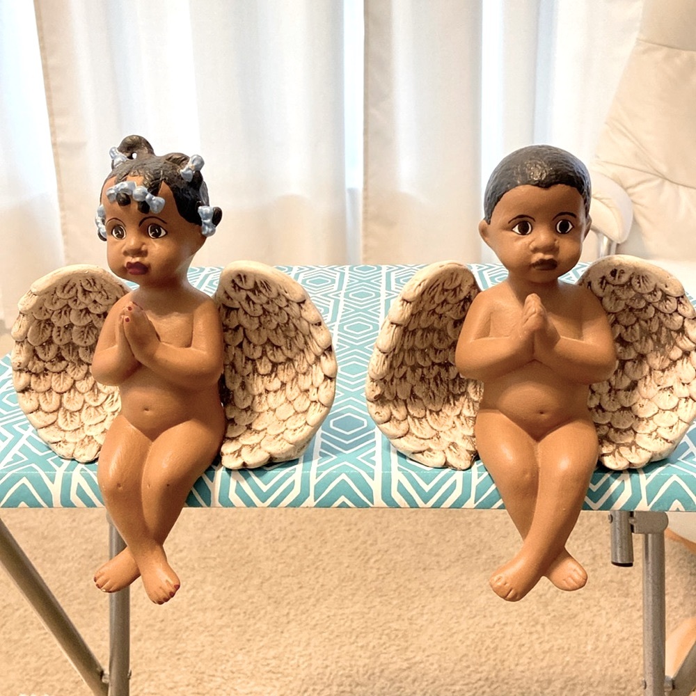 Brown Skin Angle boy and girl ceramic, hand crafted figures.